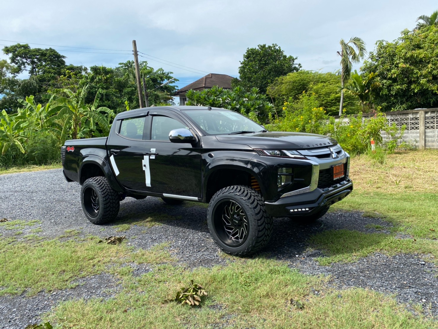 TRITON ป้ายแดงจัดทรงเมกาที่ STEP9