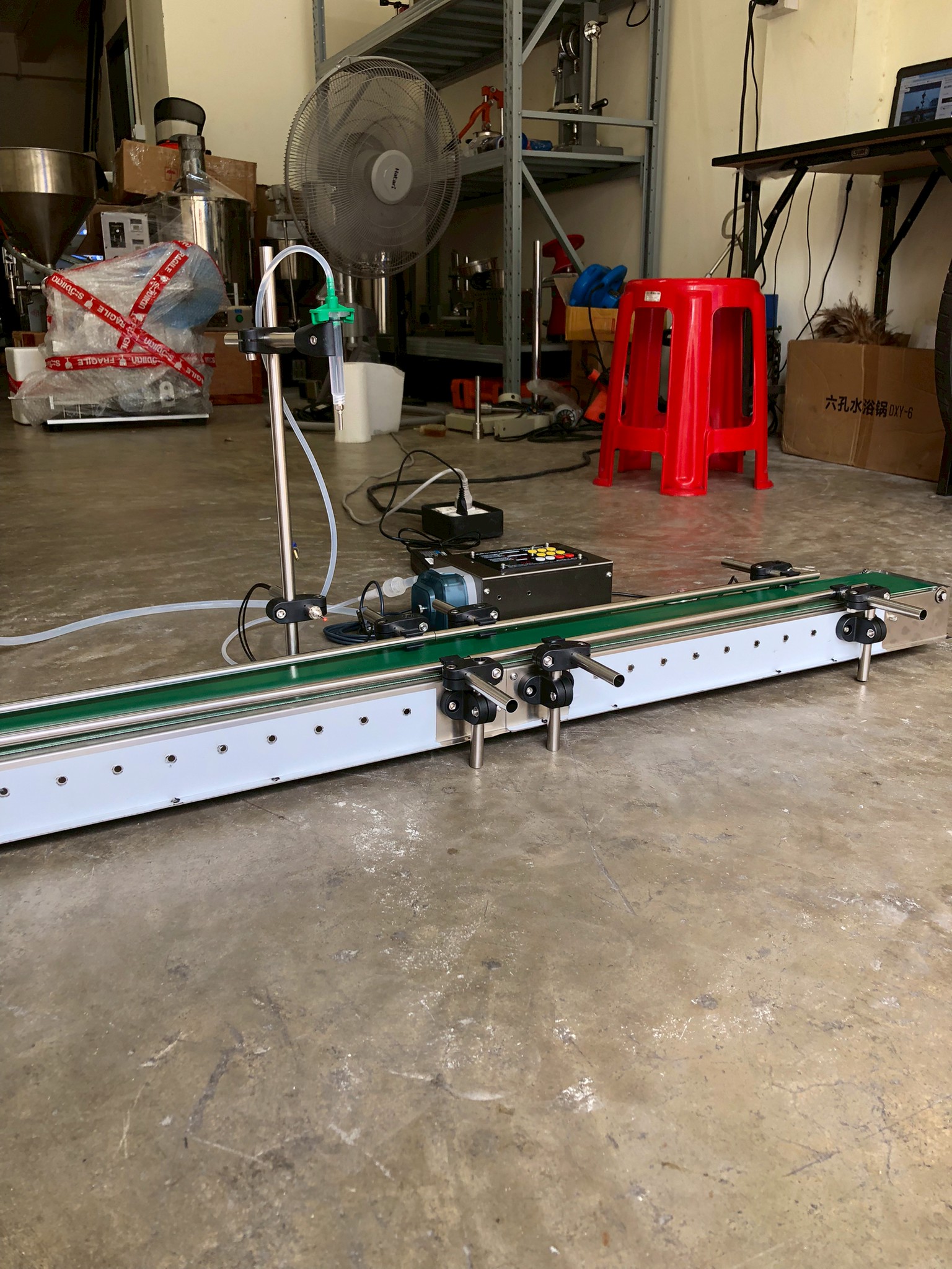 16174 เครื่องบรรจุของเหลวเเบบสายพาน (ใช้ไฟฟ้า) รุ่น ZS-DTPP100C