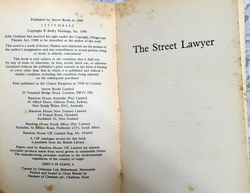 หนังสือ John Grisham ตอน The Street Lawer ปกอ่อน