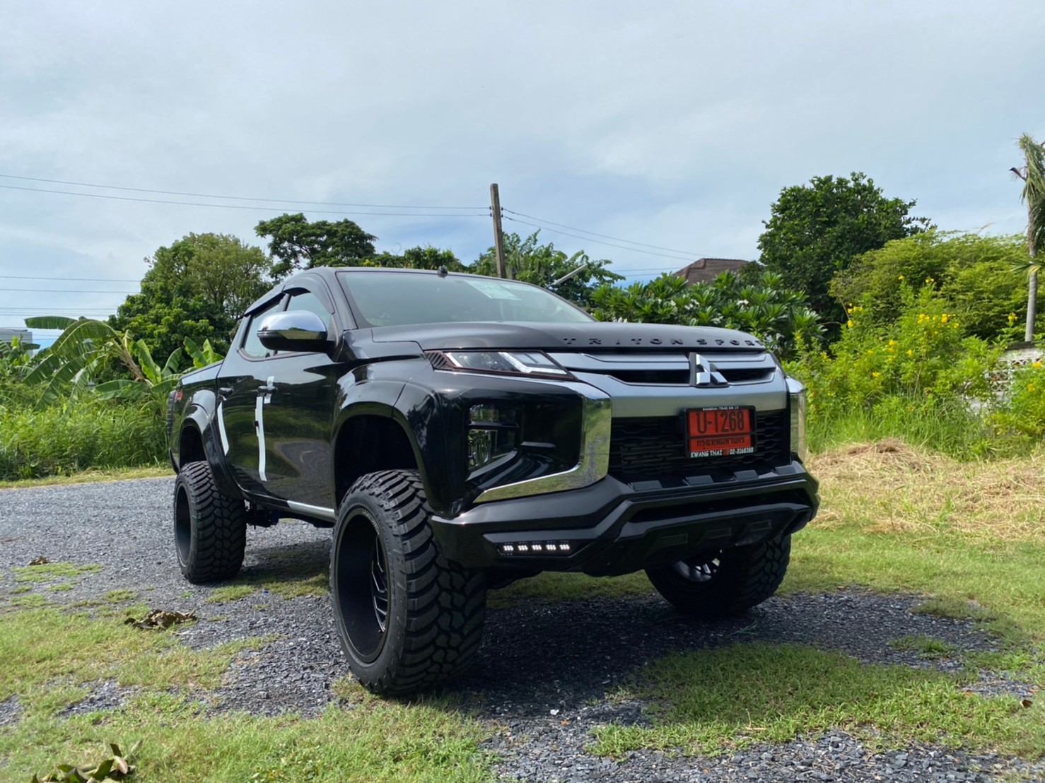 TRITON ป้ายแดงจัดทรงเมกาที่ STEP9