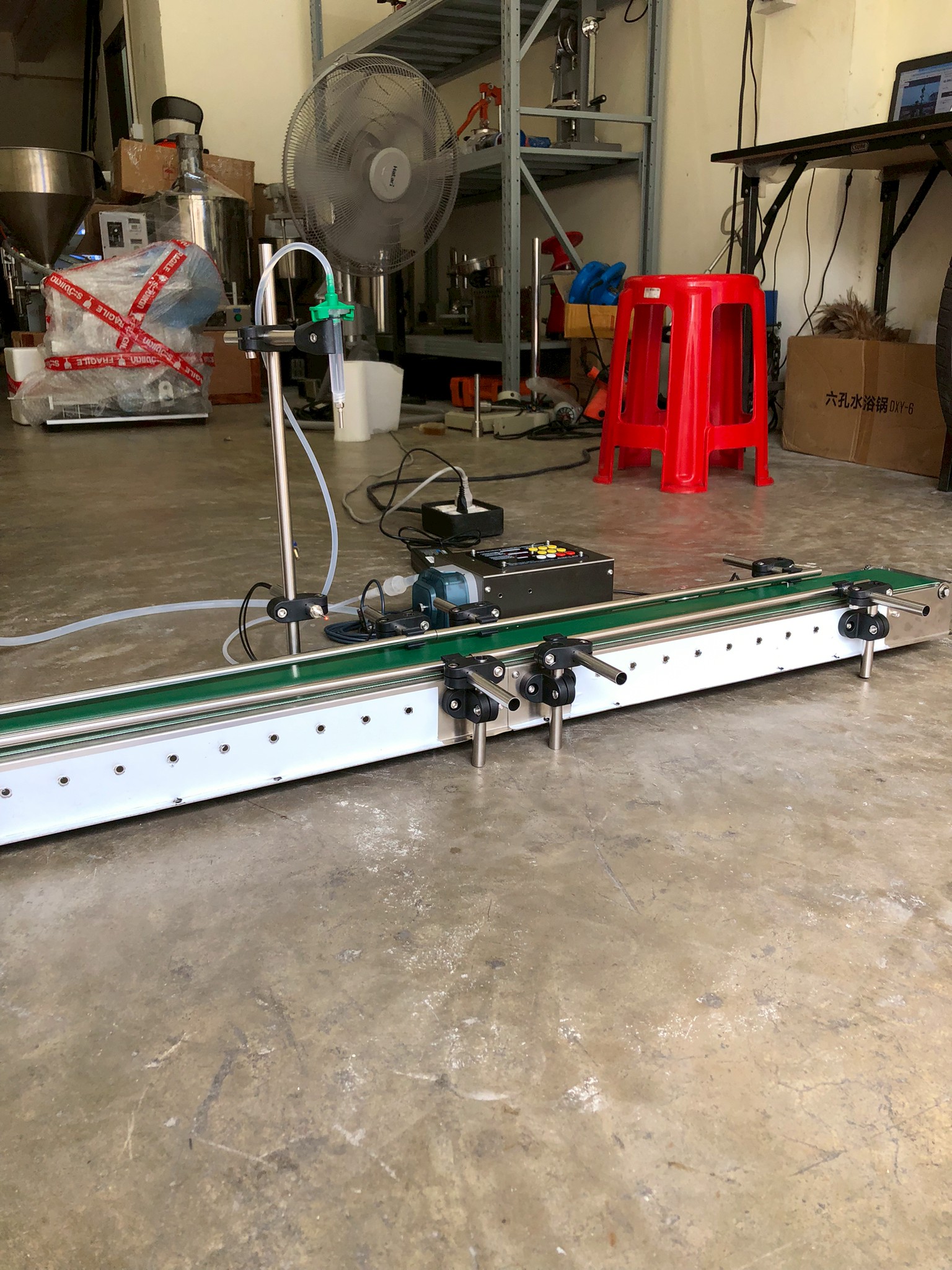 16174 เครื่องบรรจุของเหลวเเบบสายพาน (ใช้ไฟฟ้า) รุ่น ZS-DTPP100C