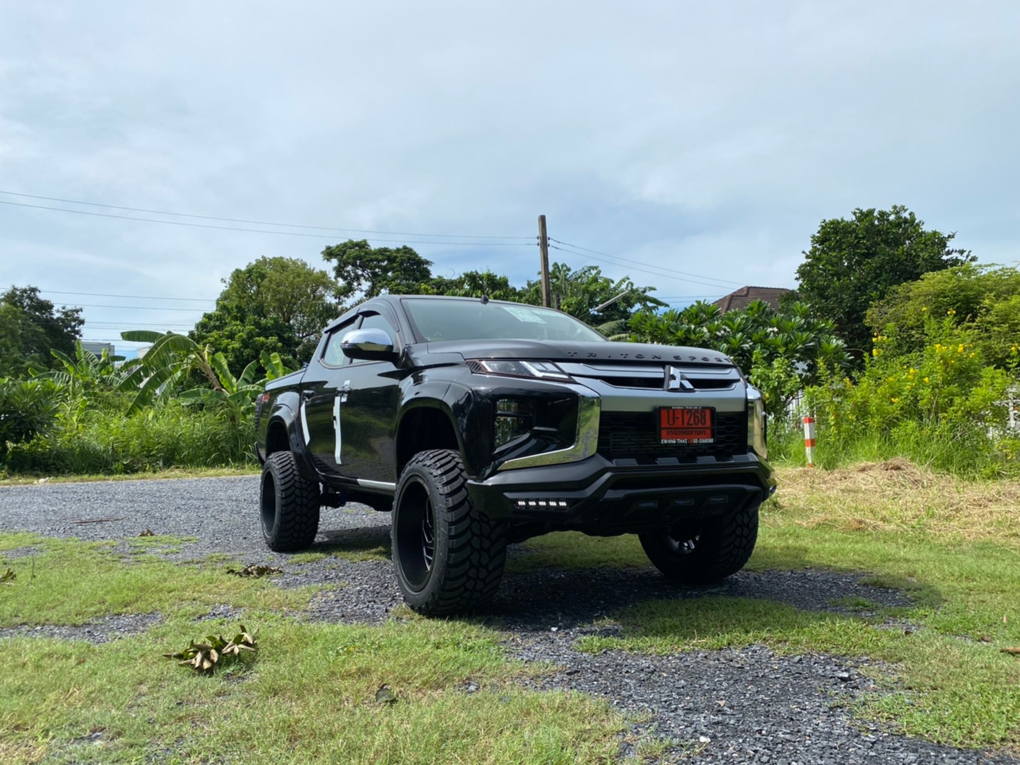 TRITON ป้ายแดงจัดทรงเมกาที่ STEP9