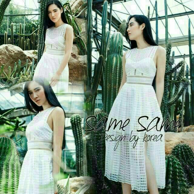 เดรสแขนกุดสีขาว