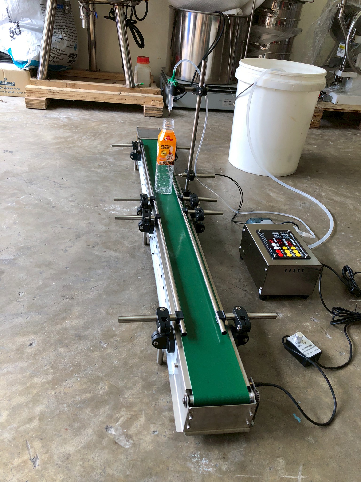 16174 เครื่องบรรจุของเหลวเเบบสายพาน (ใช้ไฟฟ้า) รุ่น ZS-DTPP100C