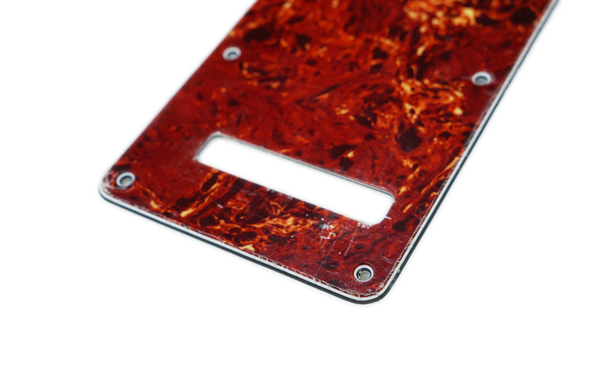 ฝาหลังกีตาร์สตรัท สีกระเเดง + น็อตสีเงิน