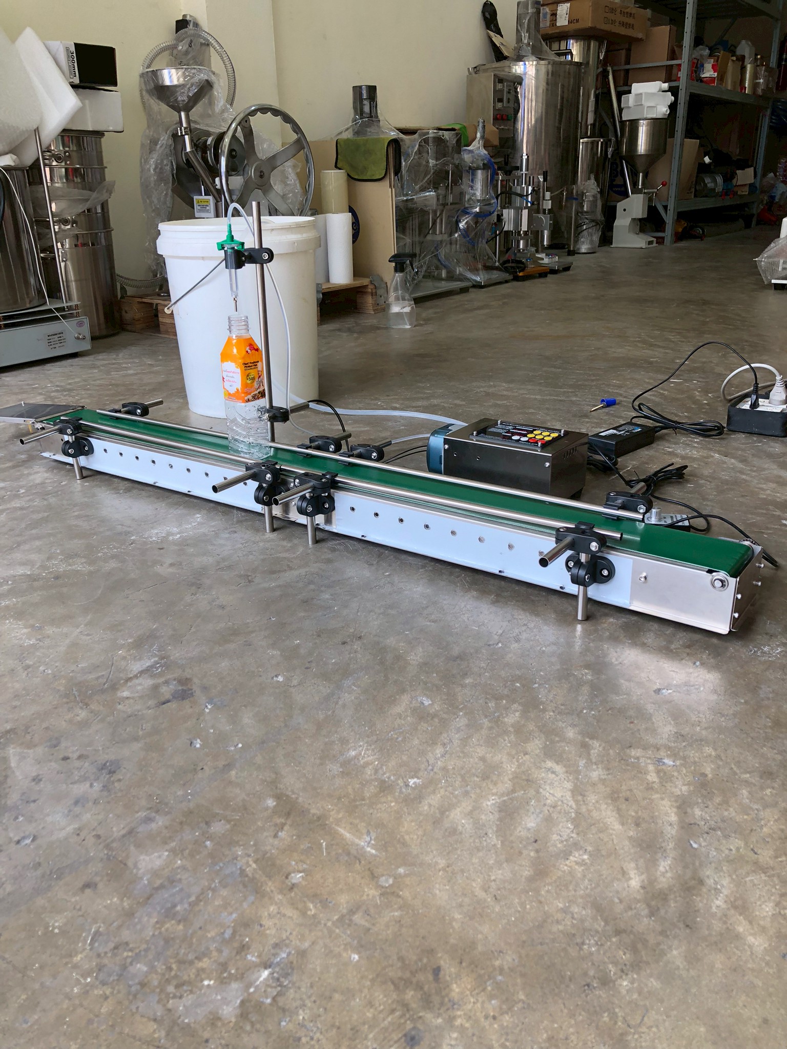 16174 เครื่องบรรจุของเหลวเเบบสายพาน (ใช้ไฟฟ้า) รุ่น ZS-DTPP100C