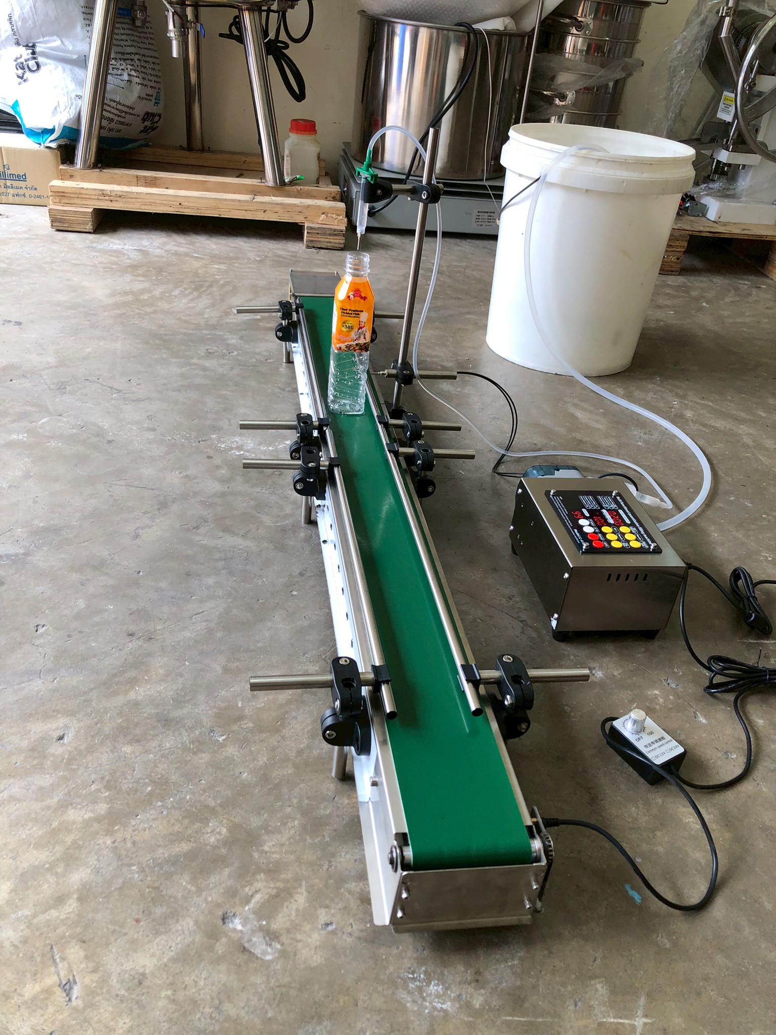 16174 เครื่องบรรจุของเหลวเเบบสายพาน (ใช้ไฟฟ้า) รุ่น ZS-DTPP100C