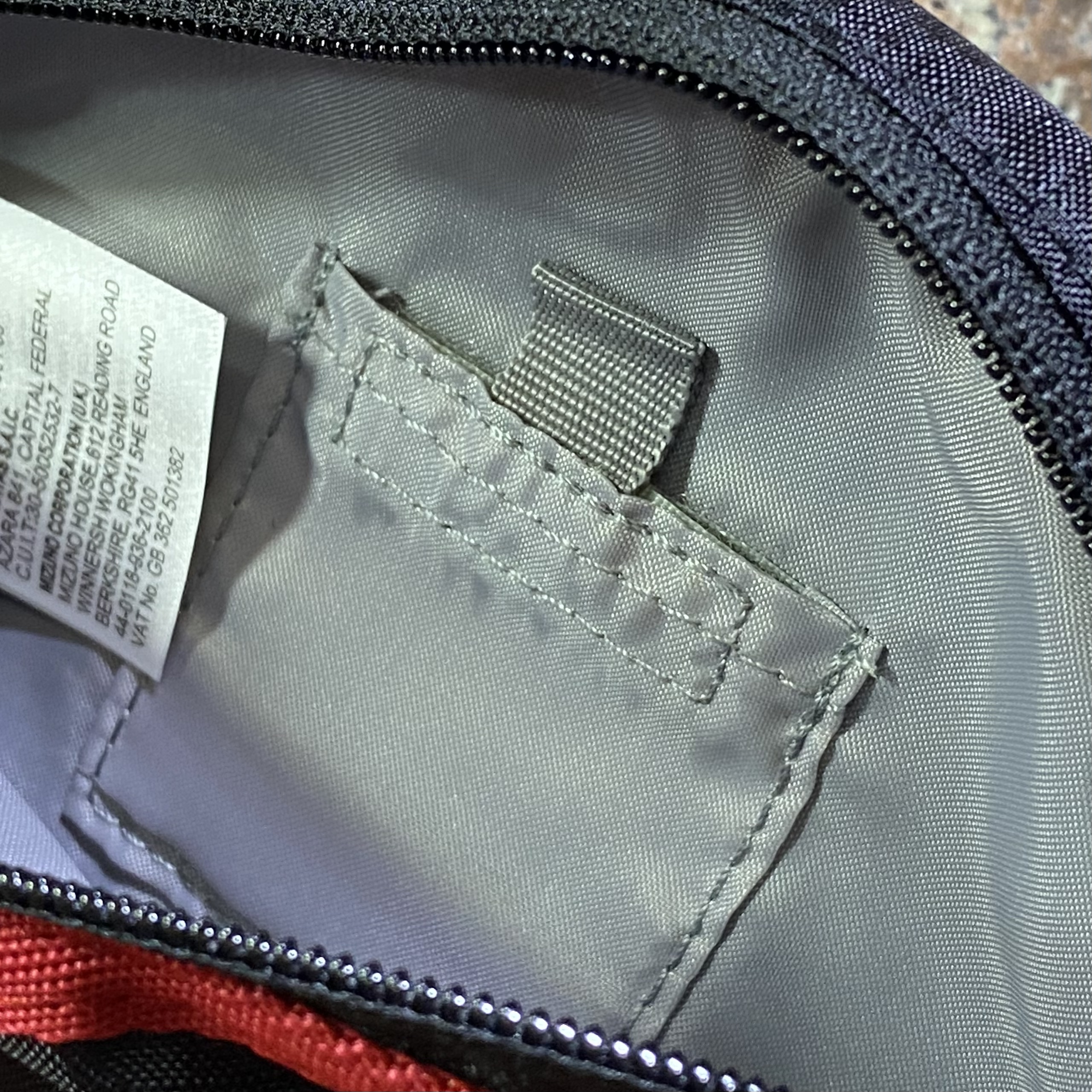 กระเป๋าวิ่ง Mizuno Running Waist Pouch M ‘BLACK/RED’