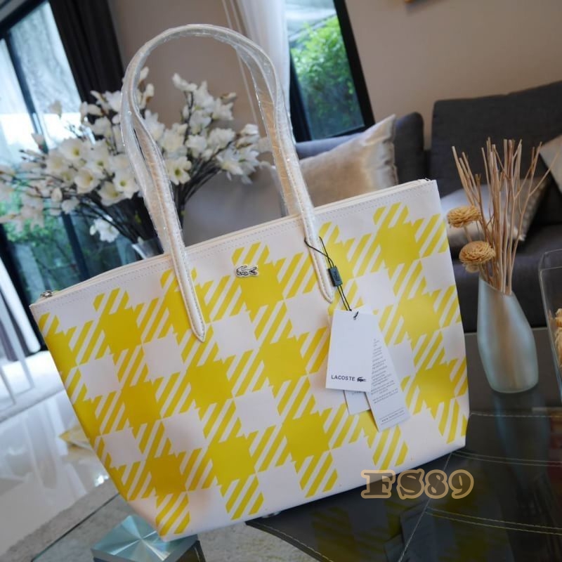 กระเป๋า LACOSTE PVC TOTE BAG โทนเหลืองขาว