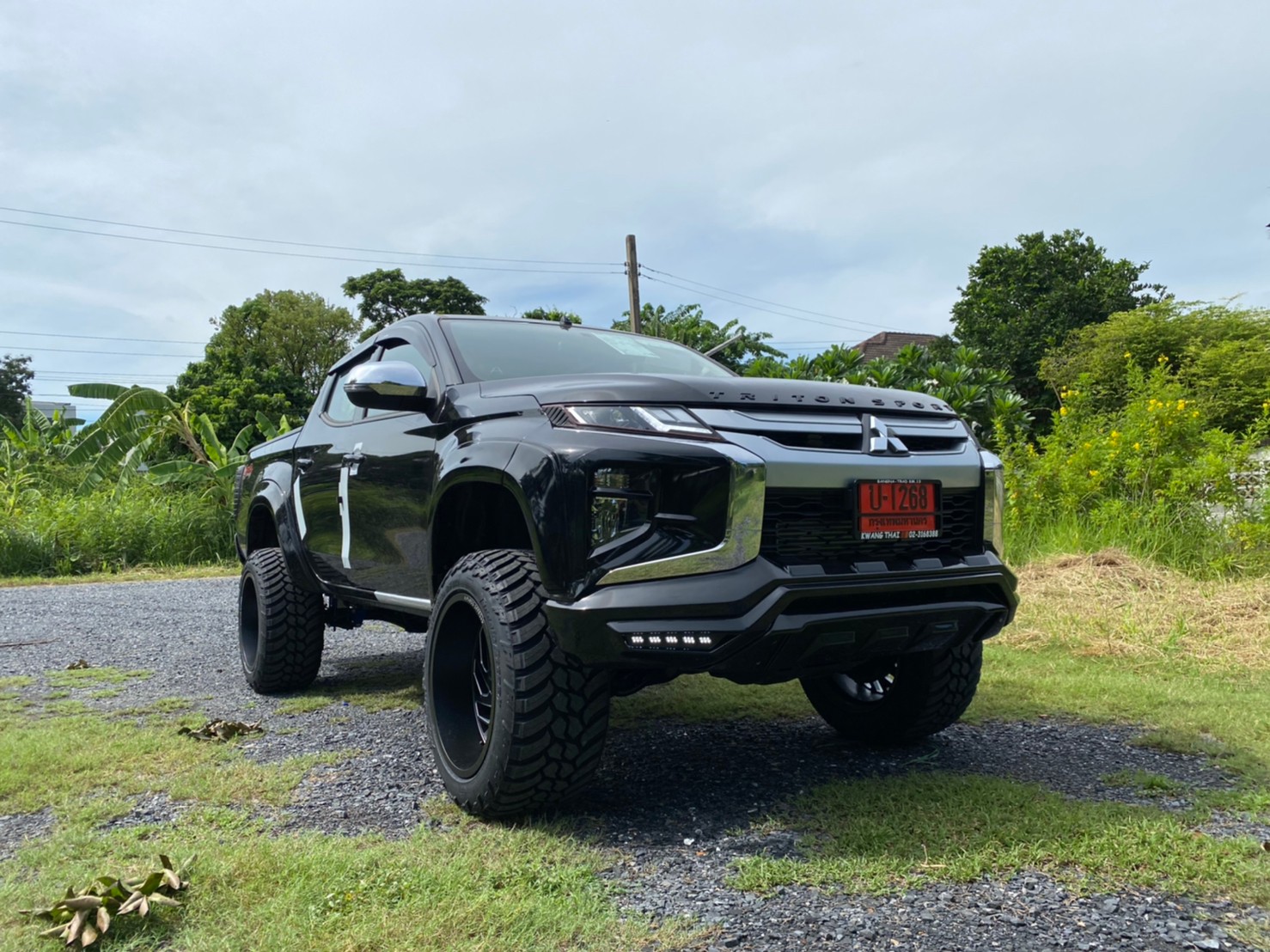 TRITON ป้ายแดงจัดทรงเมกาที่ STEP9